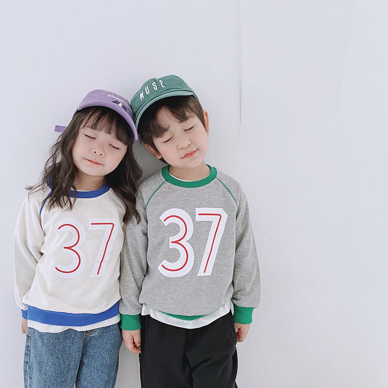 Children"s clothing wholesale autumn new children"s Round Neck Sweater Girl Baby 37 letter color matching Korean boys" sweater